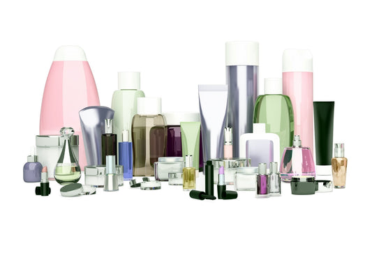 Collection of generic skincare bottles in pinks, greens, and greys.