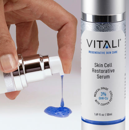 Vitali's blue copper peptide skincare product being pumped from the bottle, with a close up of the skin cell restorative serum bottle to the side.