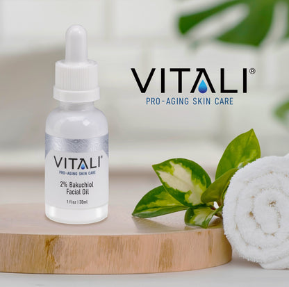 A bottle of Vitali's 2% Bakuchiol Facial Oil with the text, "Vitali pro-aging skin care."