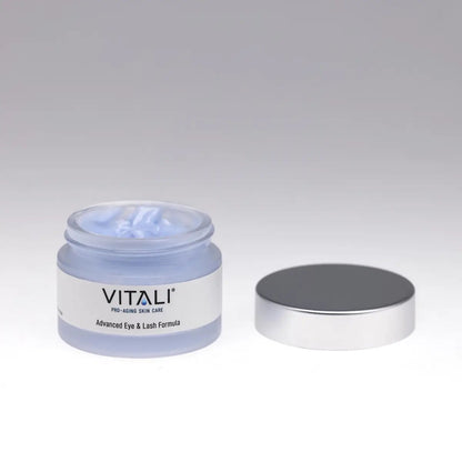 A small tub of Vitali's blue advanced eye and lash formula.